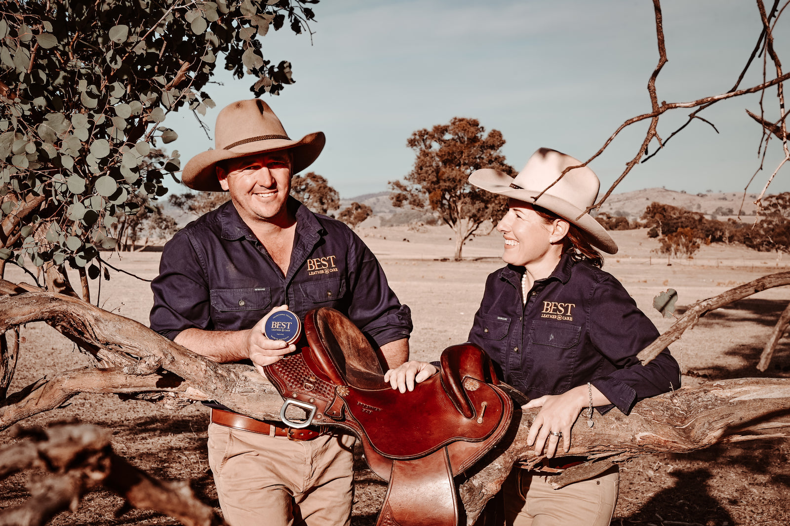 Nat and Fonz Corbett with a saddle and a tin of BEST Leather Care